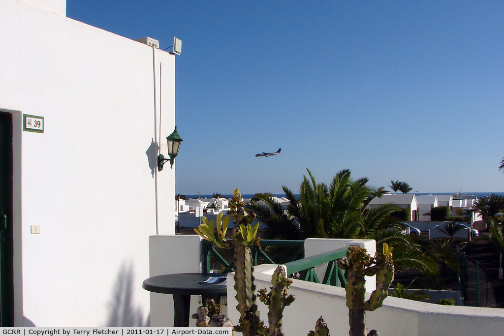Arrecife Airport (Lanzarote Airport), Arrecife Spain (GCRR) - For enthusiasts looking for accomodation for Lanzarote - the Playa Pocillos Apartments are just
5 minutes walk from the threshold - Room 39 also
has good views of all landing traffic