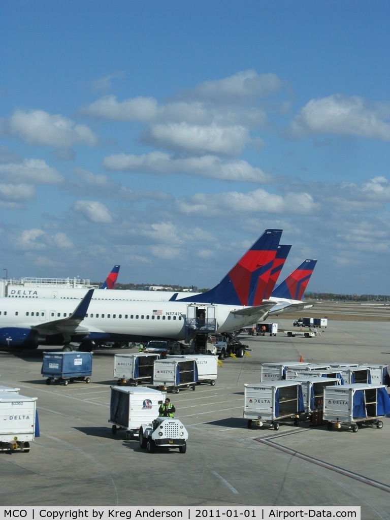 Orlando International Airport (MCO) - A row of Delta tails at MCO.