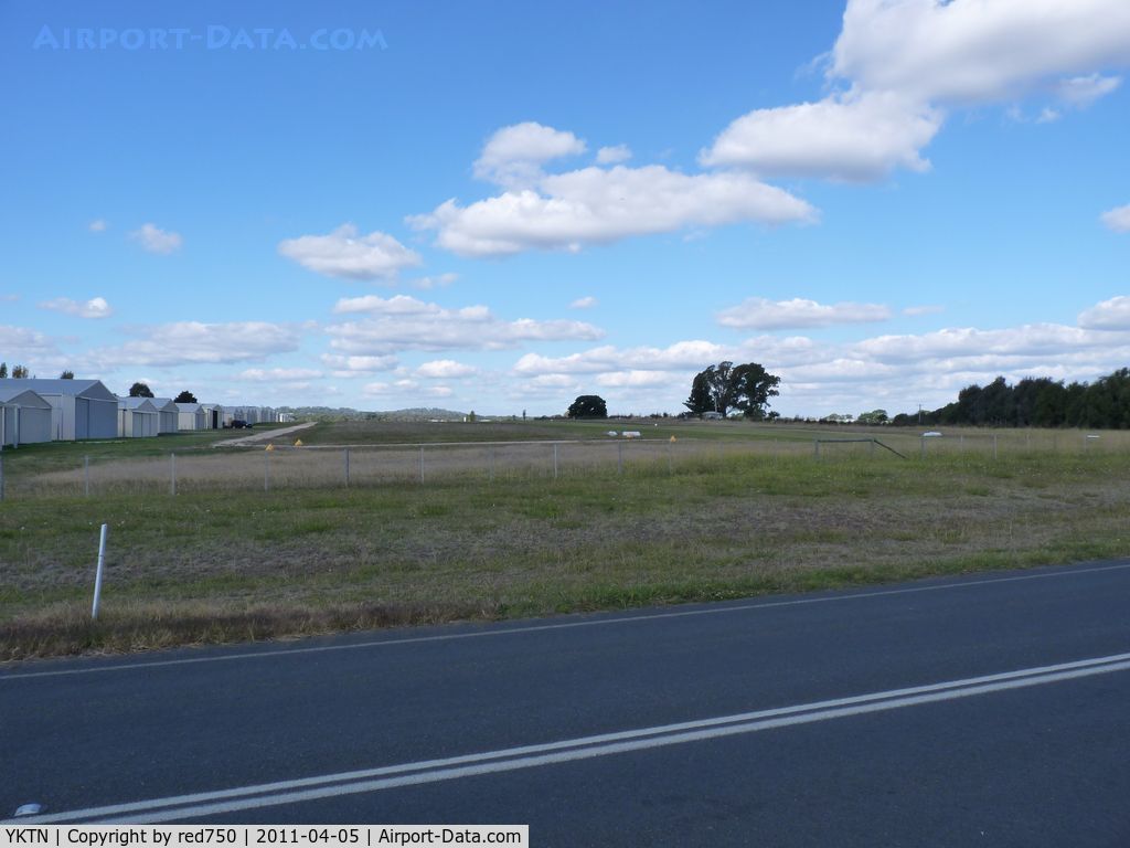 Kyneton Airport, Kyneton, Victoria Australia (YKTN) - Kyneton Airfield Hangars and grass strip looking east.