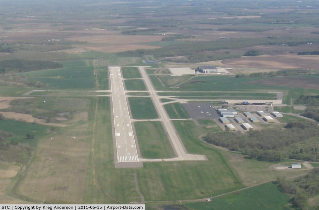 St Cloud Regional Airport (STC) - Departing St. Cloud Regional Airport after departing runway 5. Looking towards the southeast.