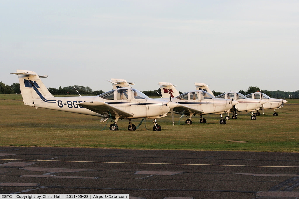 Cranfield Airport, Cranfield, England United Kingdom (EGTC) - PA-38's lined up at Cranfield