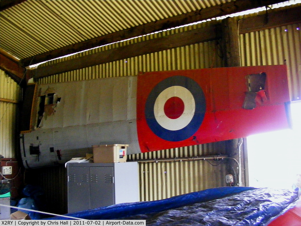 X2RY Airport - DHC Chipmunk wing in the hangar at Rayne Hall Farm