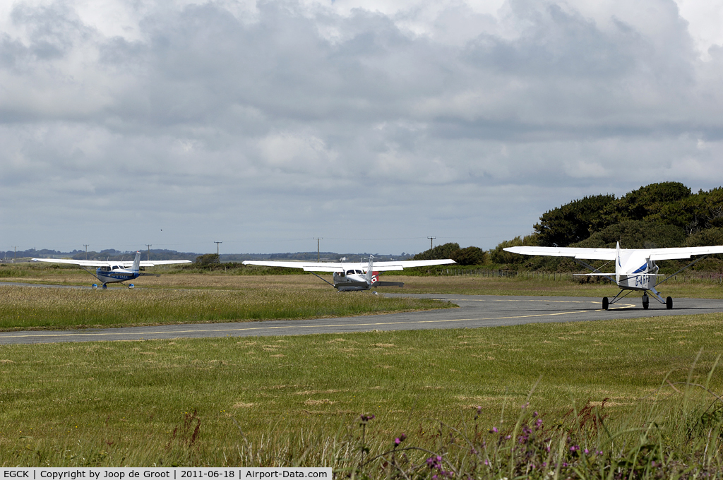 Caernarfon Airport, Caernarfon, Wales United Kingdom (EGCK) - Heathrow like line up prior to take off.