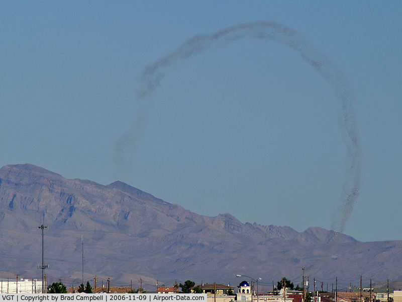 North Las Vegas Airport (VGT) - Smoke trails left from aircraft practicing for Aviation Nation 2006. Seen from about 10 miles away.