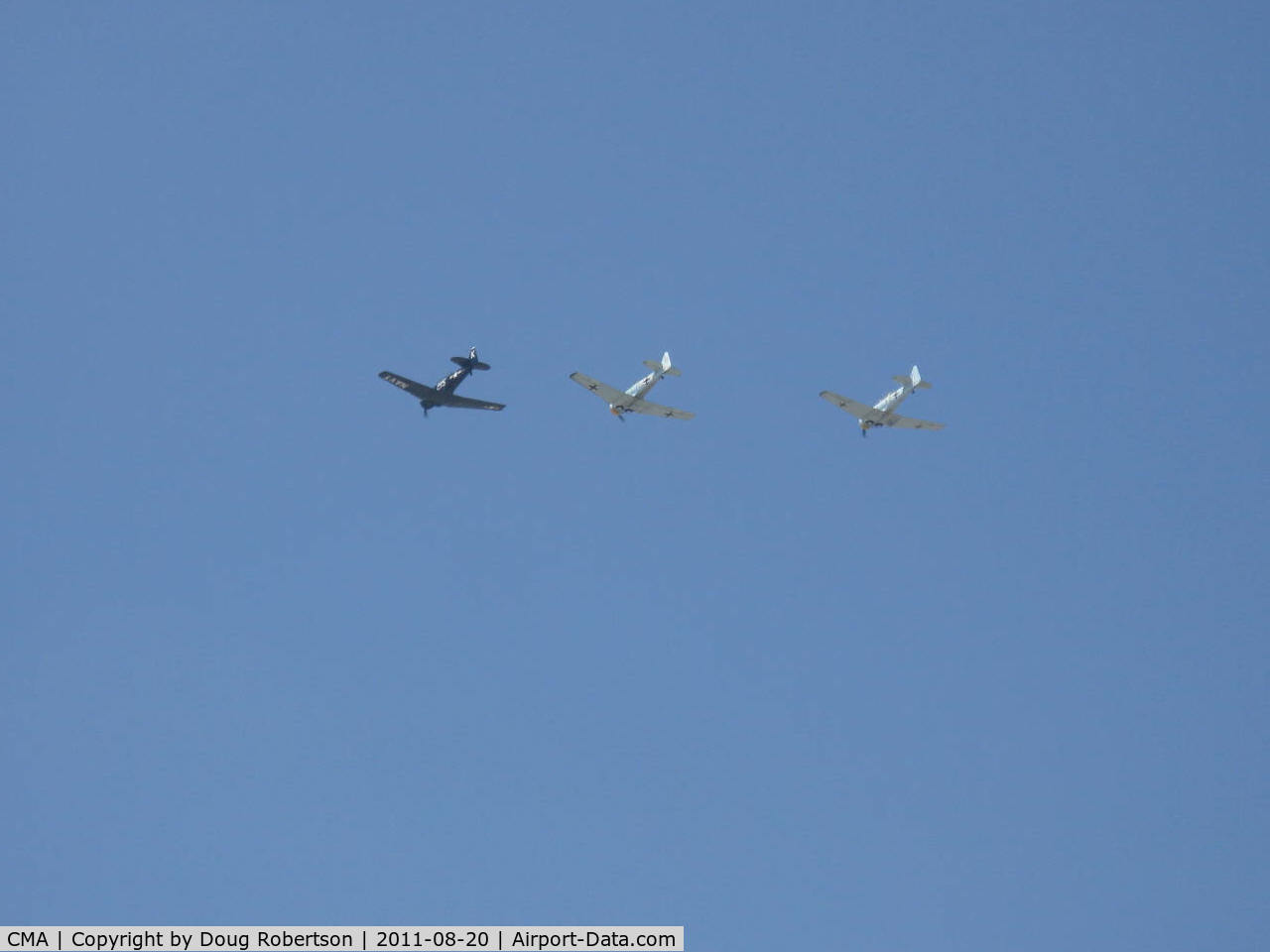 Camarillo Airport (CMA) - Three North American AT-6s in formation flight-2011 'Wings Over Camarillo' Airshow. The two light colored aircraft are from The Condor Squadron