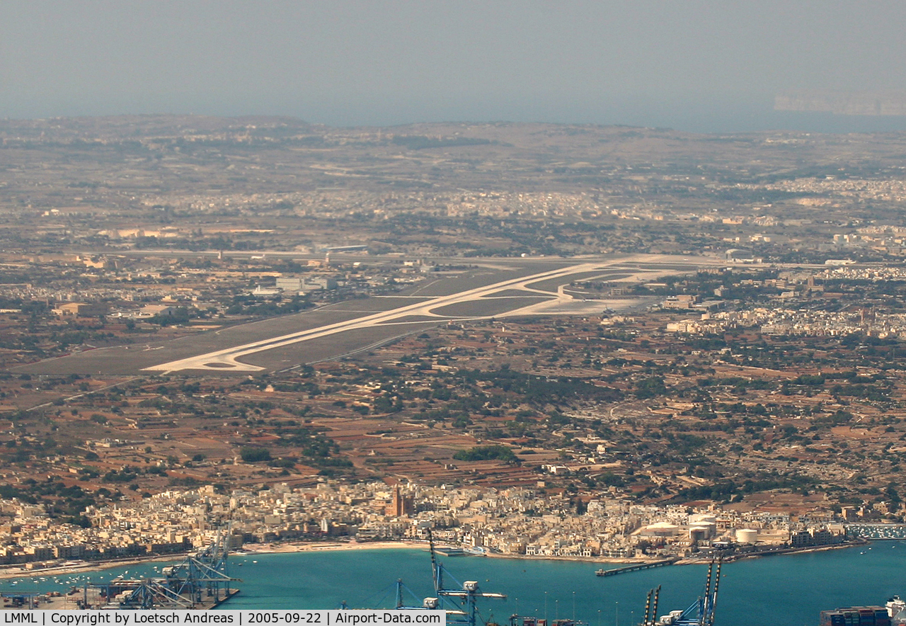 Malta International Airport (Luqa Airport), Luqa Malta (LMML) - Malta Freeport and the nice Town Birzebbuga, we are one right base for RWY31 to Luqa Airport