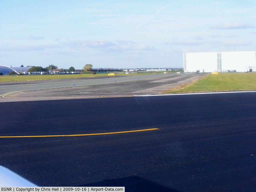 Hawarden Airport, Chester, England United Kingdom (EGNR) - view down taxyway Delta and the A380 factory