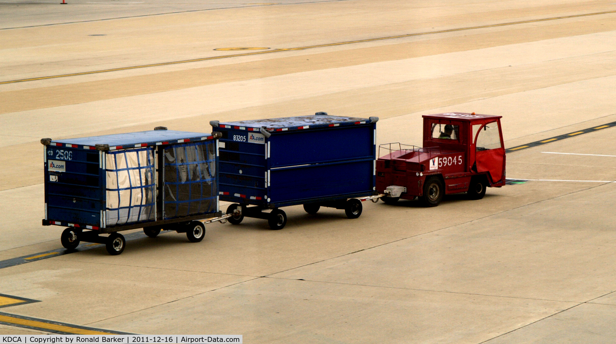 Ronald Reagan Washington National Airport (DCA) - Tug 59045 with two baggage carts