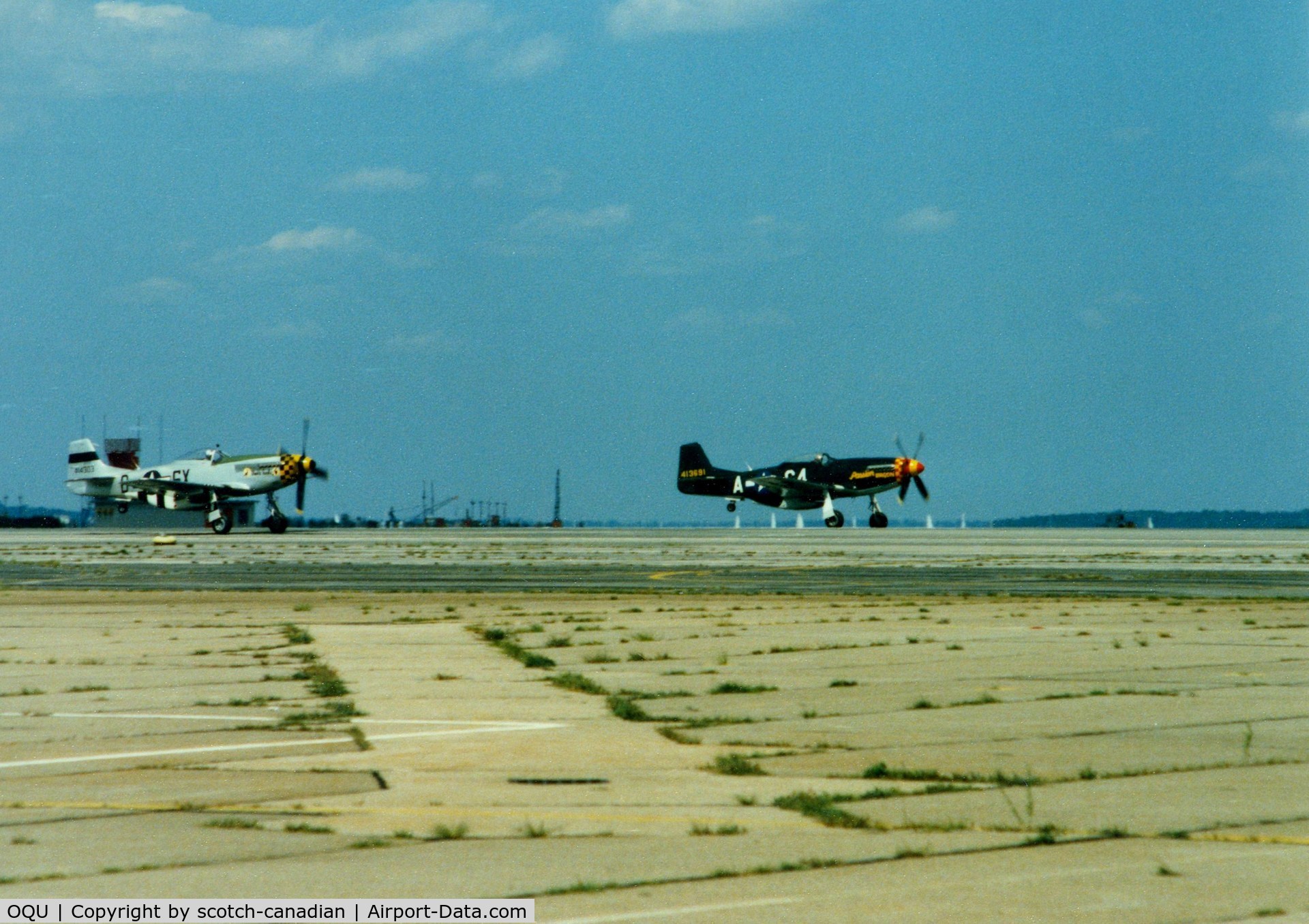 Quonset State Airport (OQU) - 1944 North American P-51D Mustang's N51EA and N51U at Quonset State Airport, North Kingstown, RI - circa 1980's 