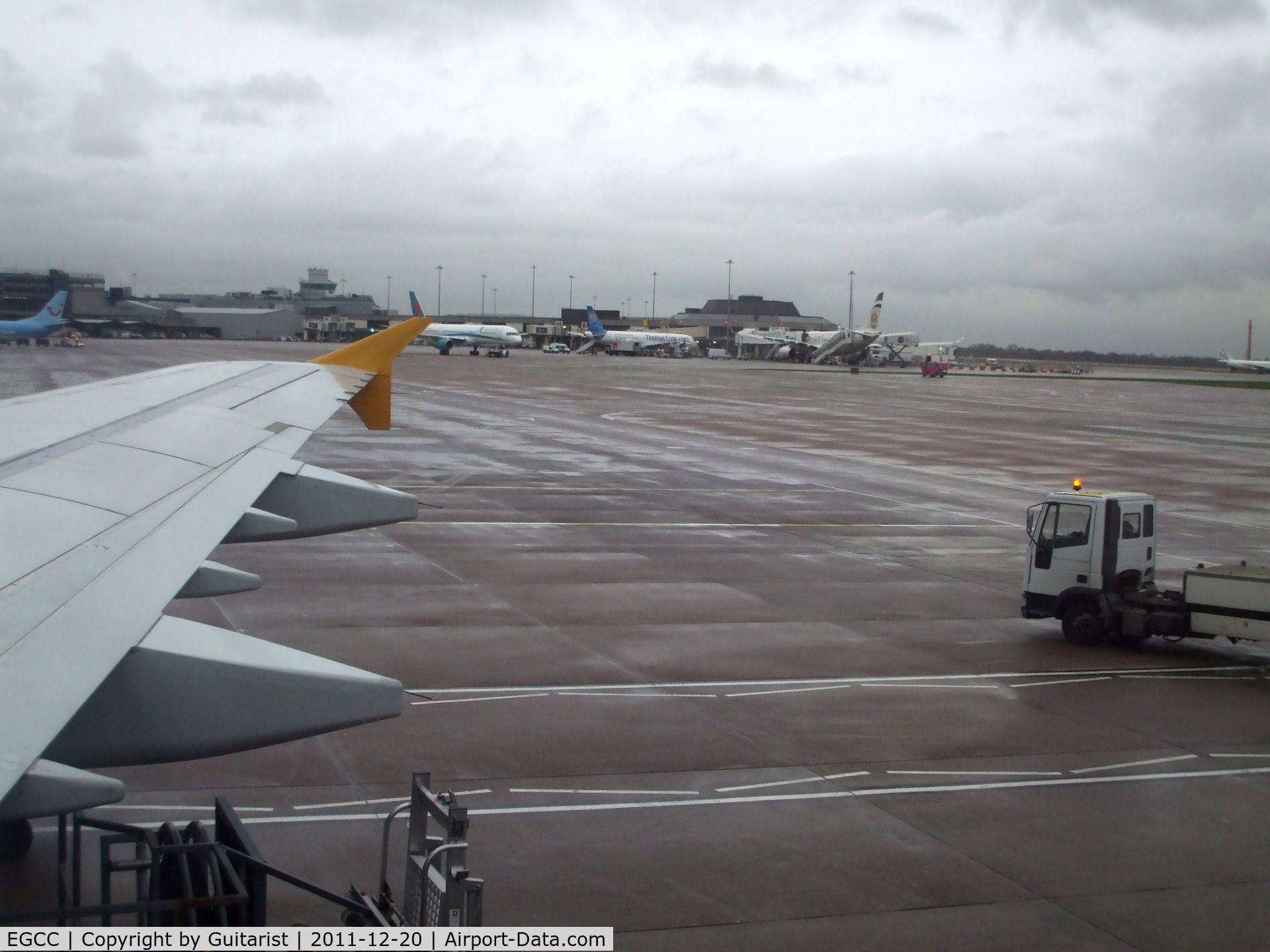 Manchester Airport, Manchester, England United Kingdom (EGCC) - From 20c and sunshine to 5c and rain in 3 hours