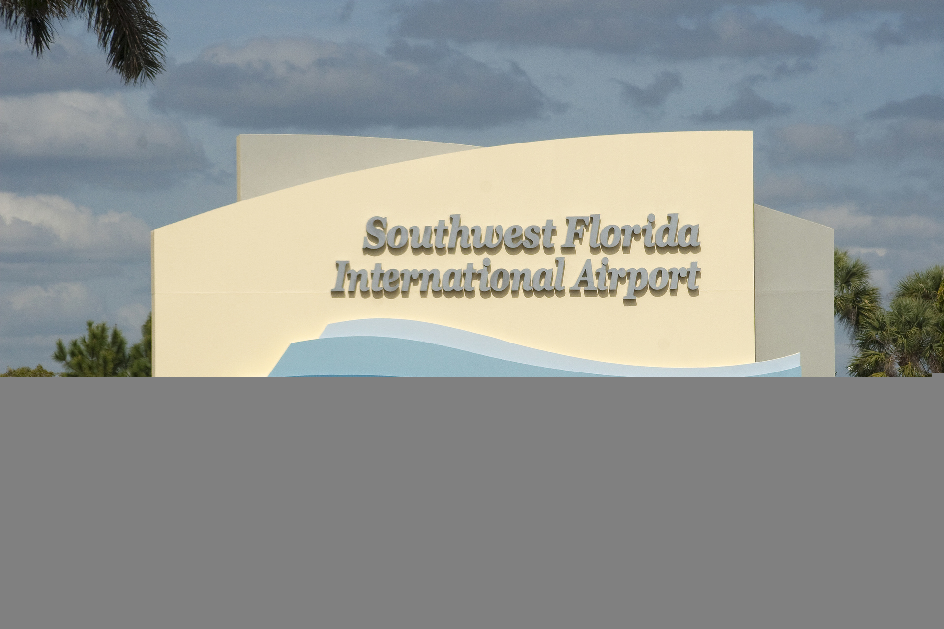 Southwest Florida International Airport (RSW) - Sign at the main accesss road to Southwest Florida International Airport