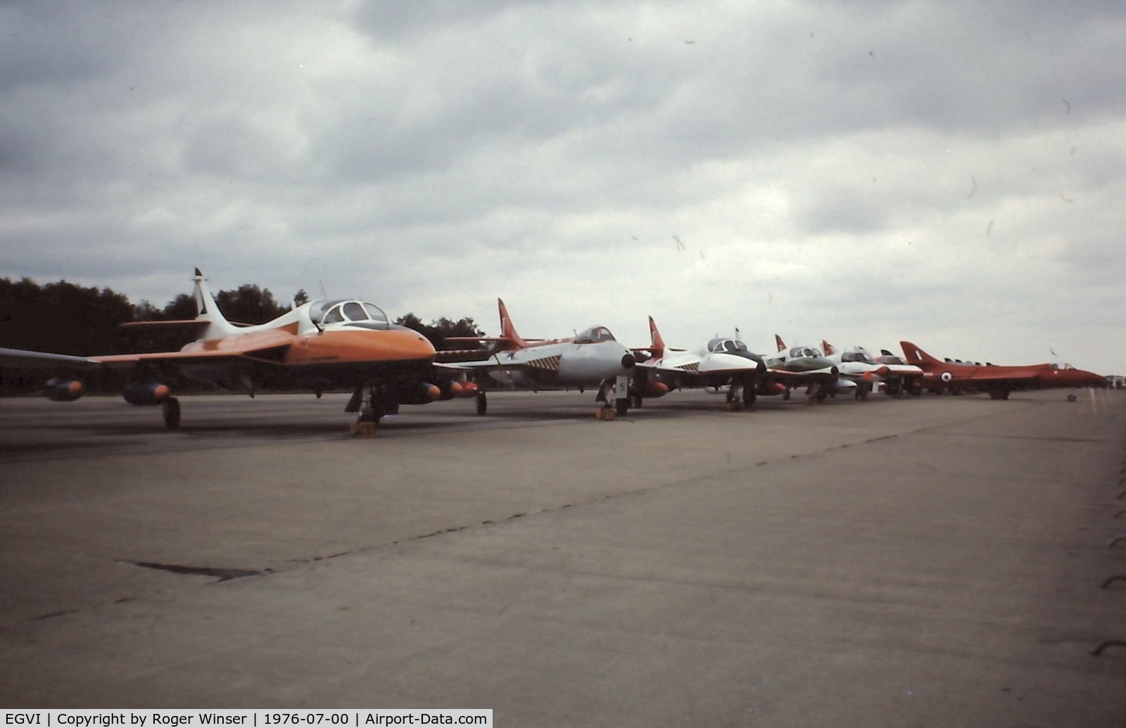 EGVI Airport - Line up of Hawker Hunters (including the prototype)
at IAT 76 held at RAF Greenham Common in July 1976. Celebrating 25 years since the first flight of the prototype on 20 July 1951.