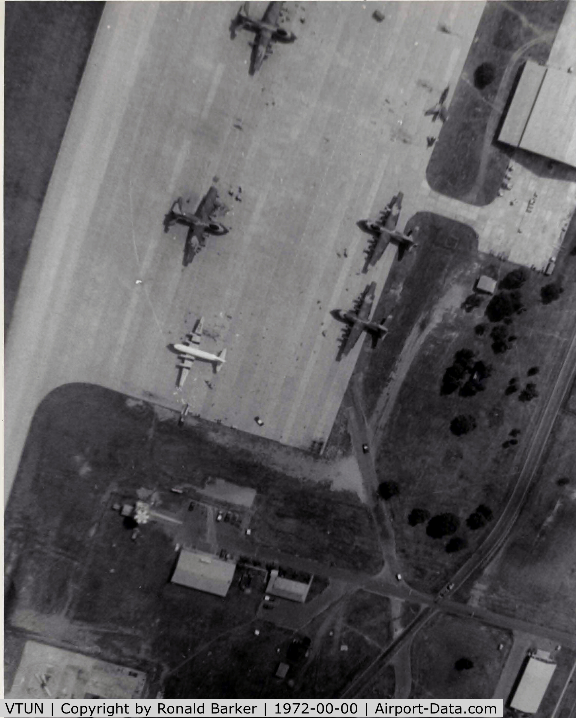 Khorat Air Force Base Airport, Nakhon Ratchasima (Khorat) Thailand (VTUN) - Overhead pattern summer 1972.  Note the F-105 that is in two pieces in the upper right corner.