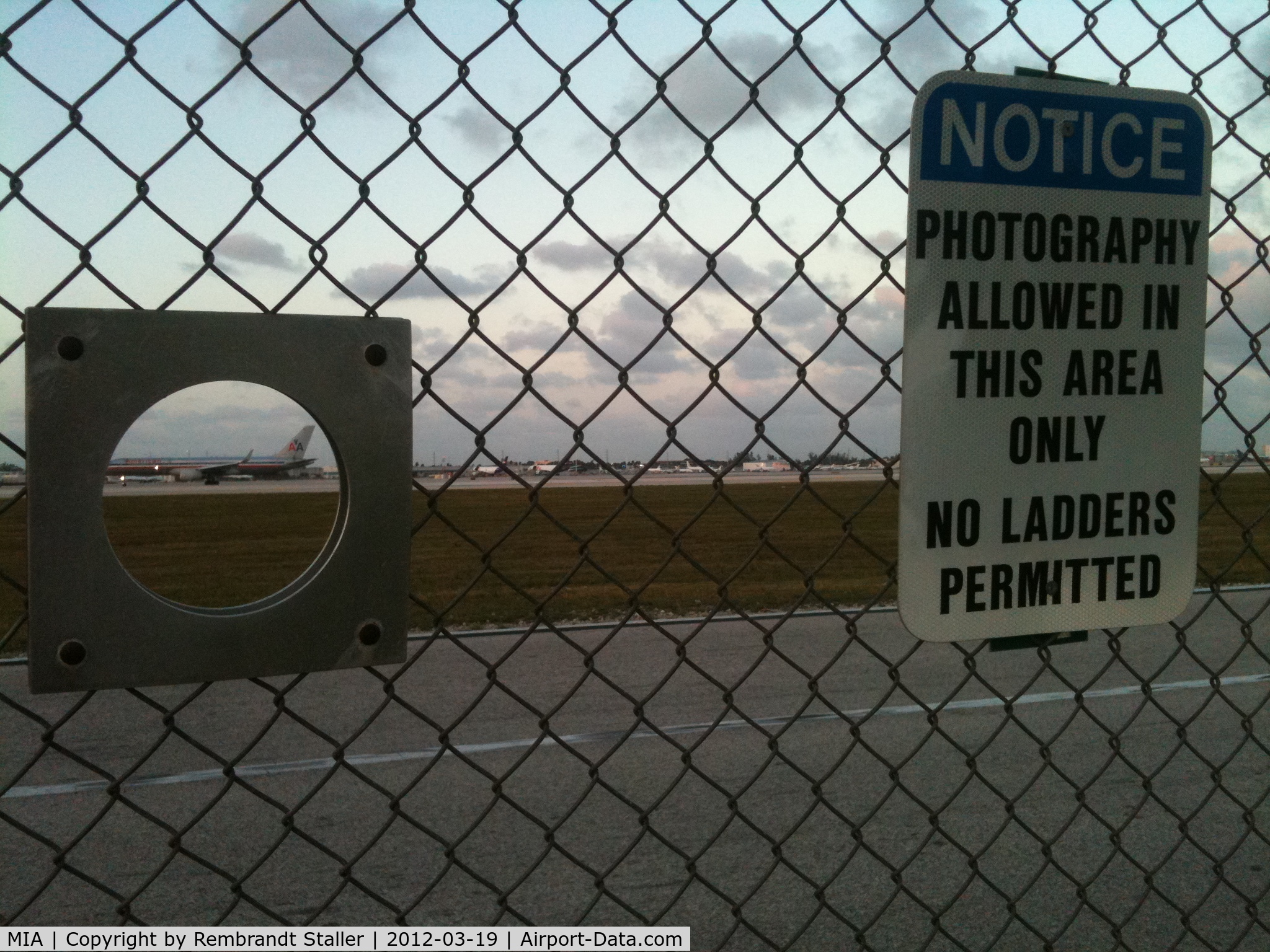 Miami International Airport (MIA) - Those nice holes in the fence for our long lenses!