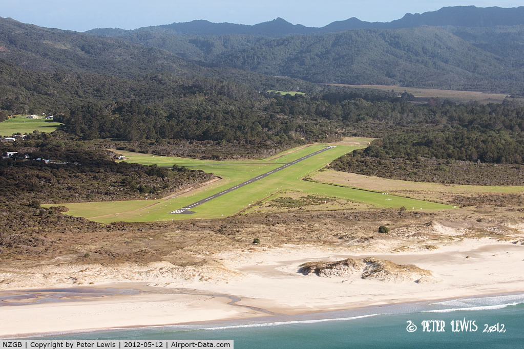 Great Barrier Aerodrome Airport, Great Barrier Island New Zealand (NZGB) - Turning from base leg to final, RW28