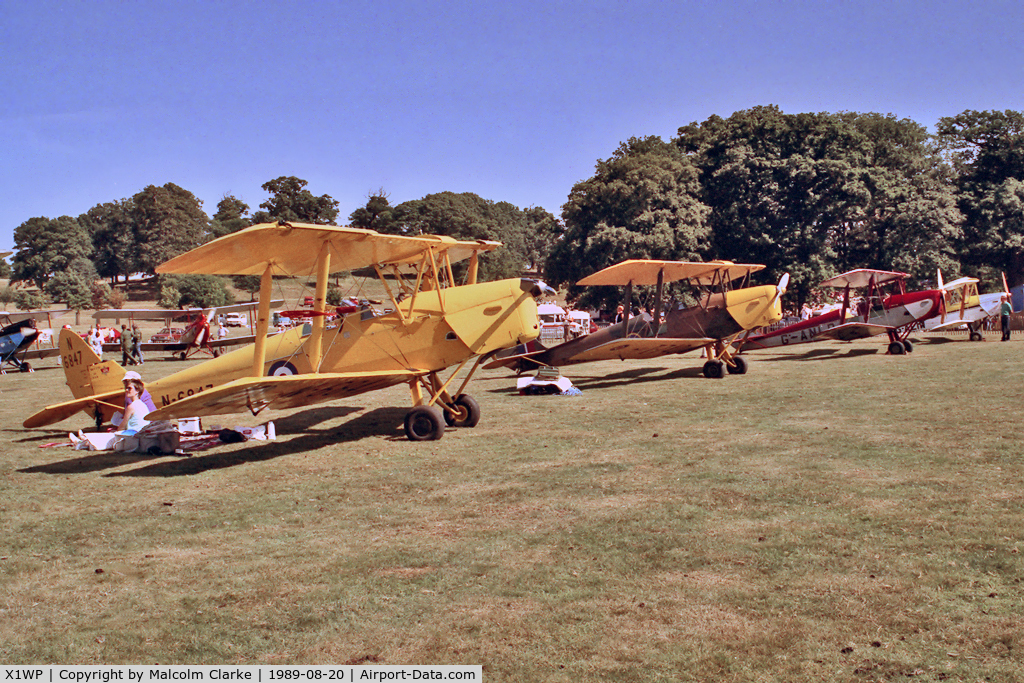 X1WP Airport - Without doubt one of the most scenic of UK annual air days, this the 1989 De Havilland Moth Rally held in the park lands of Woburn Abbey in Bedfordshire.