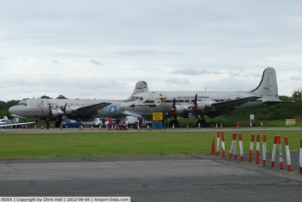 North Weald Airfield Airport, North Weald, England United Kingdom (EGSX) - N31356 Douglas DC-4 and N44914 Douglas C54B which have both been stored at North Weald for ten years