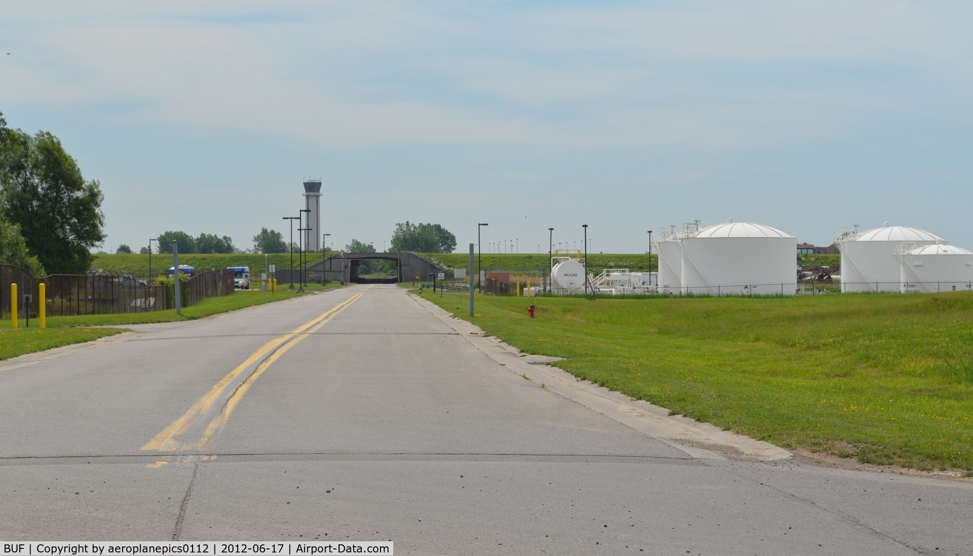 Buffalo Niagara International Airport (BUF) - A view beyond the fence of a fuel farm, ATCT, and one of three tunnels at KBUF. 