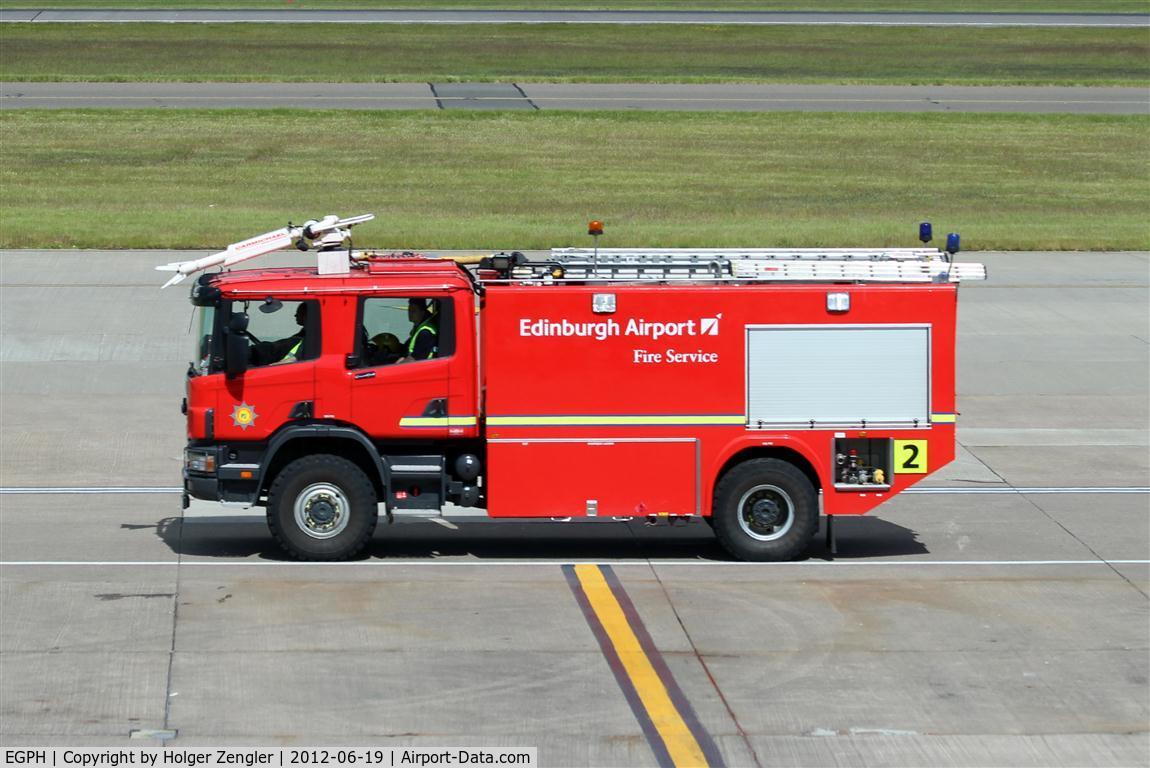 Edinburgh Airport, Edinburgh, Scotland United Kingdom (EGPH) - Fire engine on patrol.....
