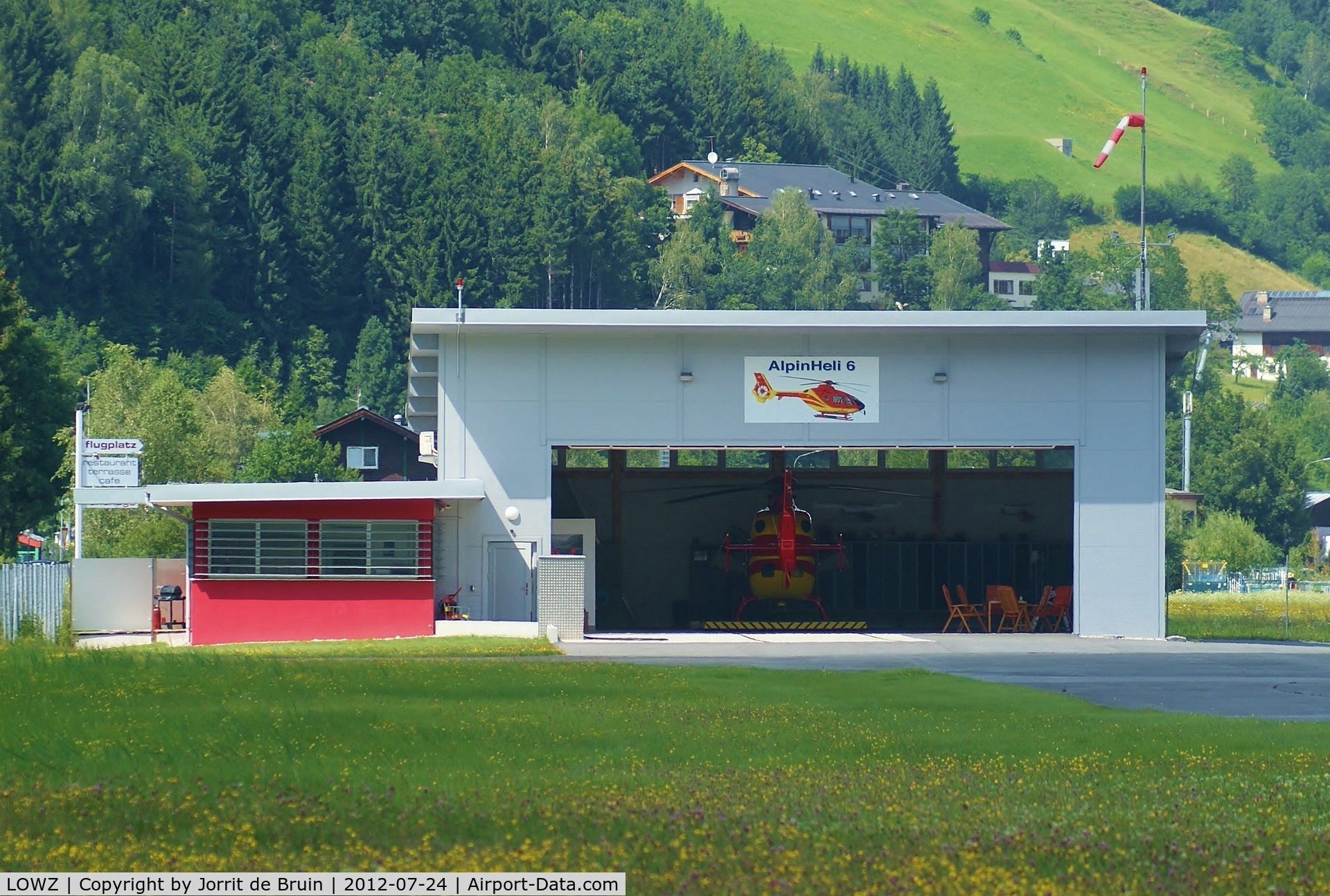 LOWZ Airport - The homebase of the AlpinHeli 6. It is ready to be pulled out of the hangar where the pilots are waiting in the lounge to fly. 