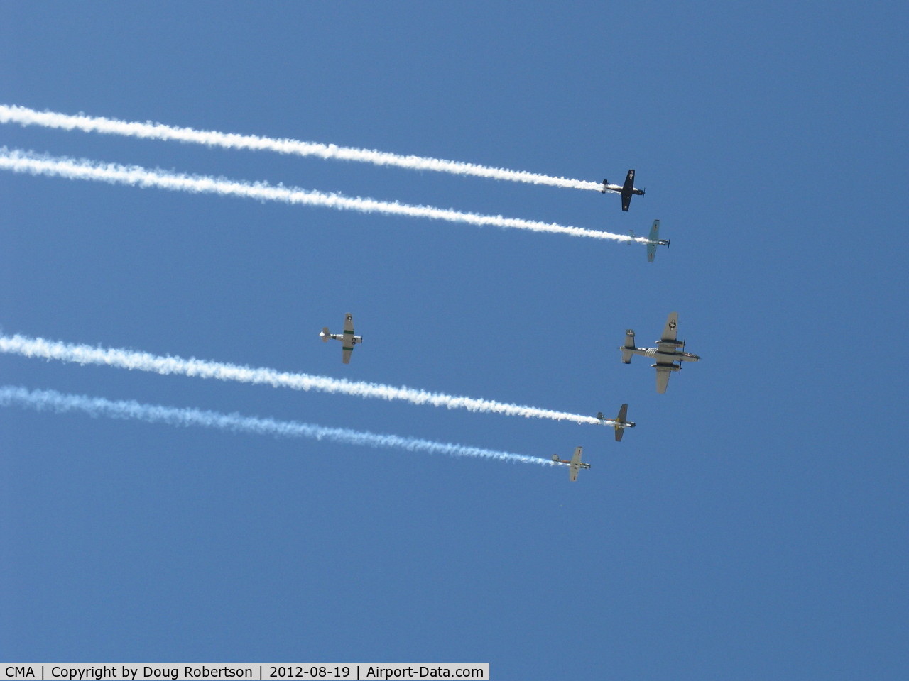 Camarillo Airport (CMA) - Condor Squadron in formation flight with smoke over 08 with N45366 'D-Day Doll'