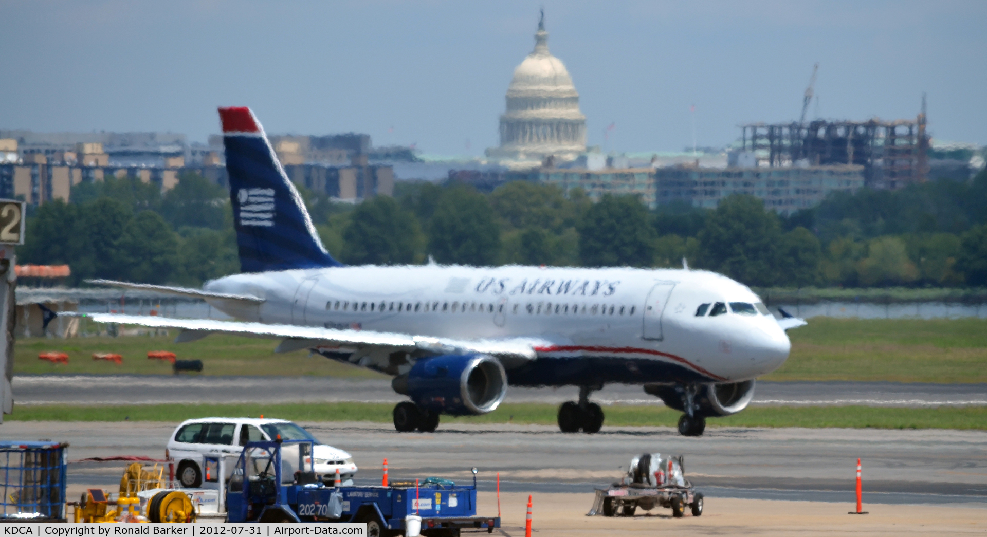 Ronald Reagan Washington National Airport (DCA) - US Airways Airbus taxing with the US Capitol in the background