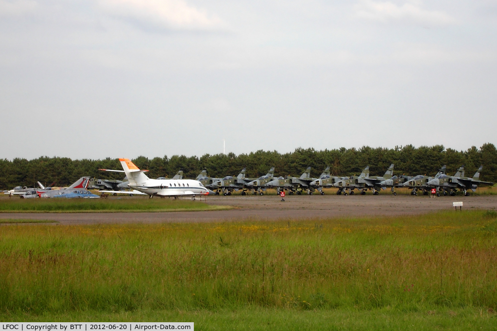 Châteaudun Airport, Châteaudun France (LFOC) - Storage area with 12 SEPECAT Jaguar A, 1 Mirage III, 1 Falcon 20 and 2 CM170 Fouga Magister one with French Aerobatic Team deco