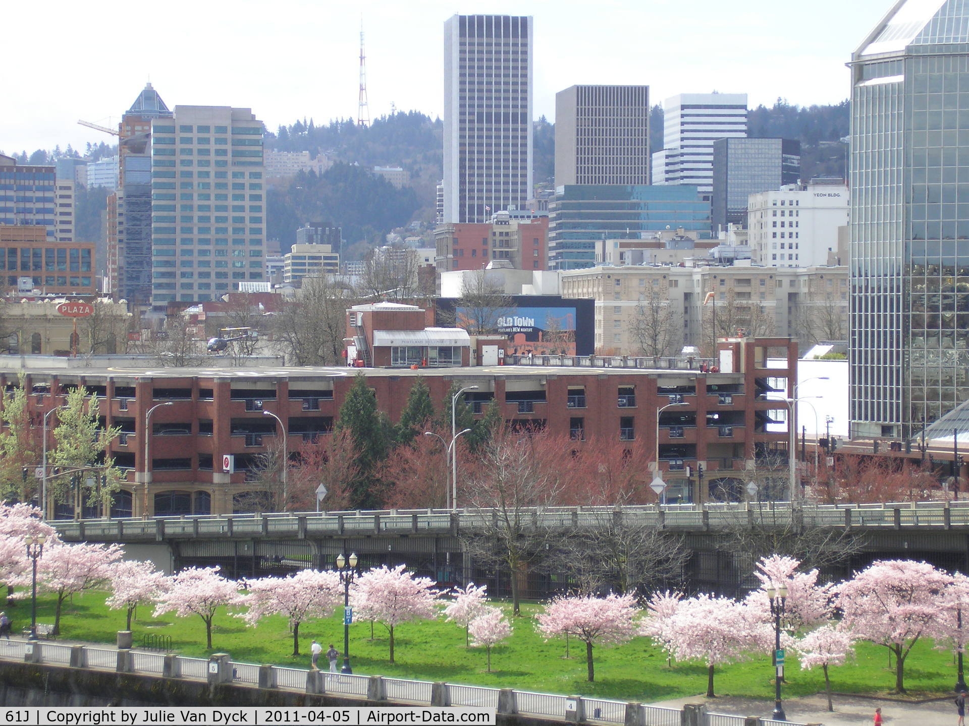 Portland Downtown Heliport (61J) - Photo  taken from the Steel Bridge. The port is on the top of the parking structure in the foreground.