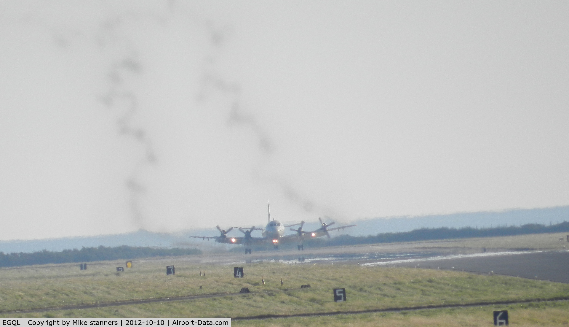 RAF Leuchars Airport, Leuchars, Scotland United Kingdom (EGQL) - VP-62 P-3C Orion 161765 landing runway 27 after a joint warrior sortie