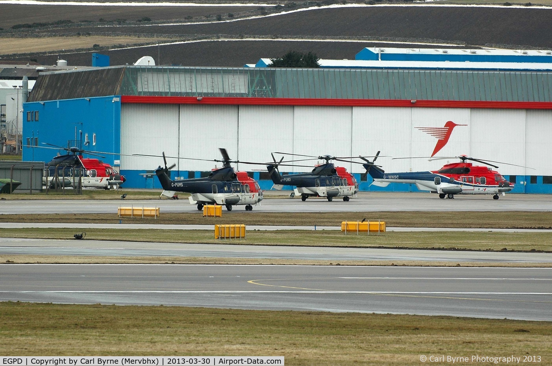 Aberdeen Airport, Aberdeen, Scotland United Kingdom (EGPD) - Some of CHC Scotia's fleet outside their hangar.
