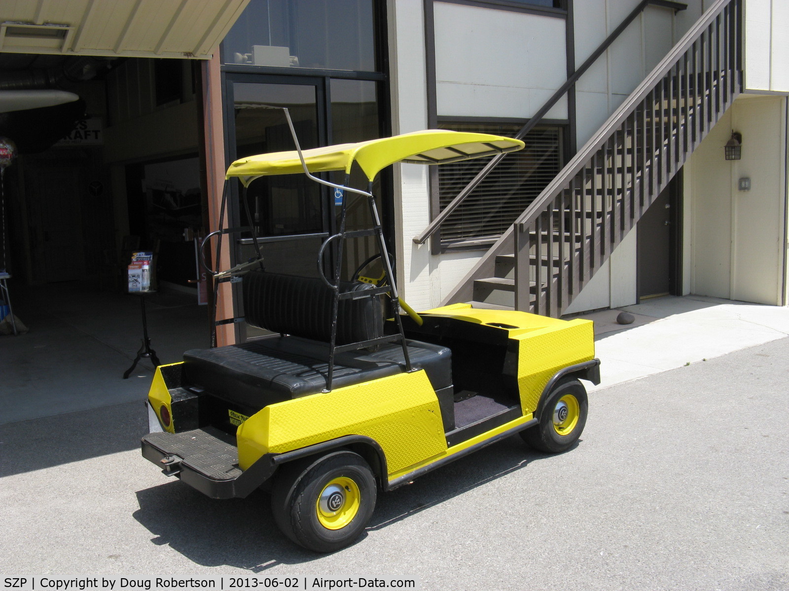 Santa Paula Airport (SZP) - The airport has many forms of personal ground transport. Here is an electric vehicle that can cleverly seat four.