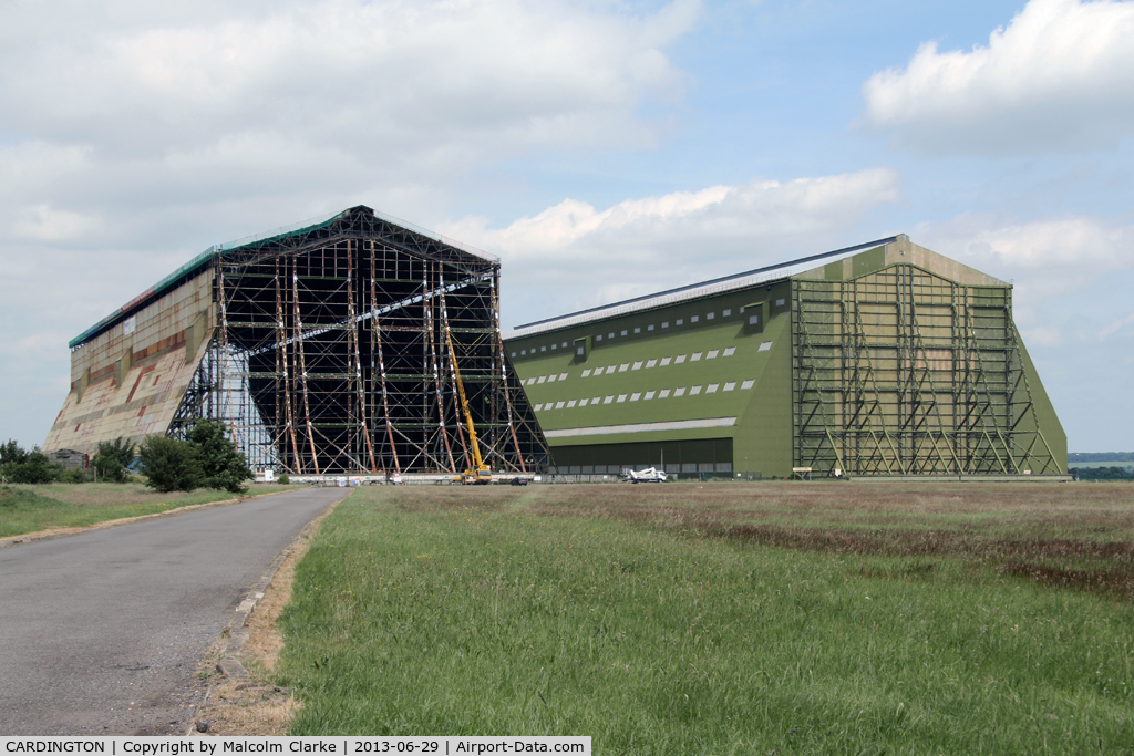 CARDINGTON Airport - Cardington's restored No 2 hangar on the right and the No 1 hangar currently under renovation. RAF Cardington (closed), June 29th 2013.