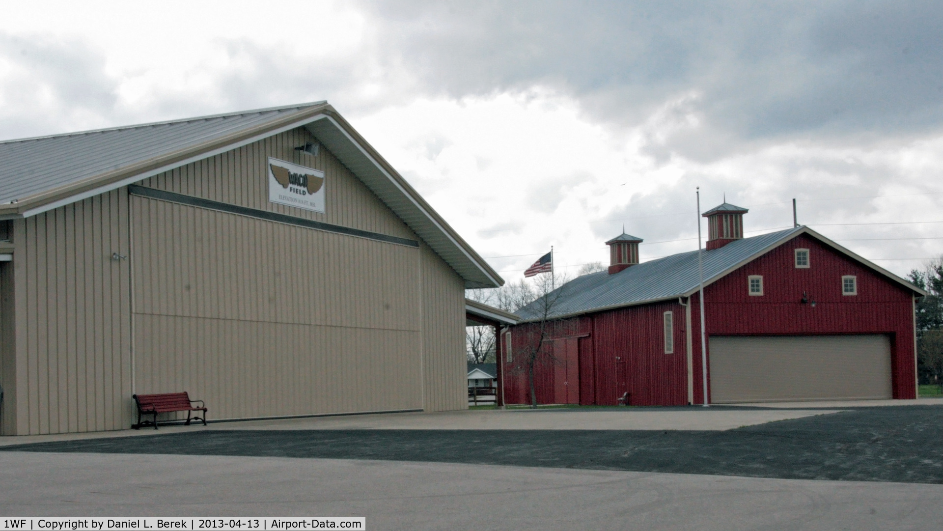 Waco Field Airport (1WF) - The old building on the right was the birthplace of Waco airplanes; the building on the left houses the Waco Aircraft Museum.