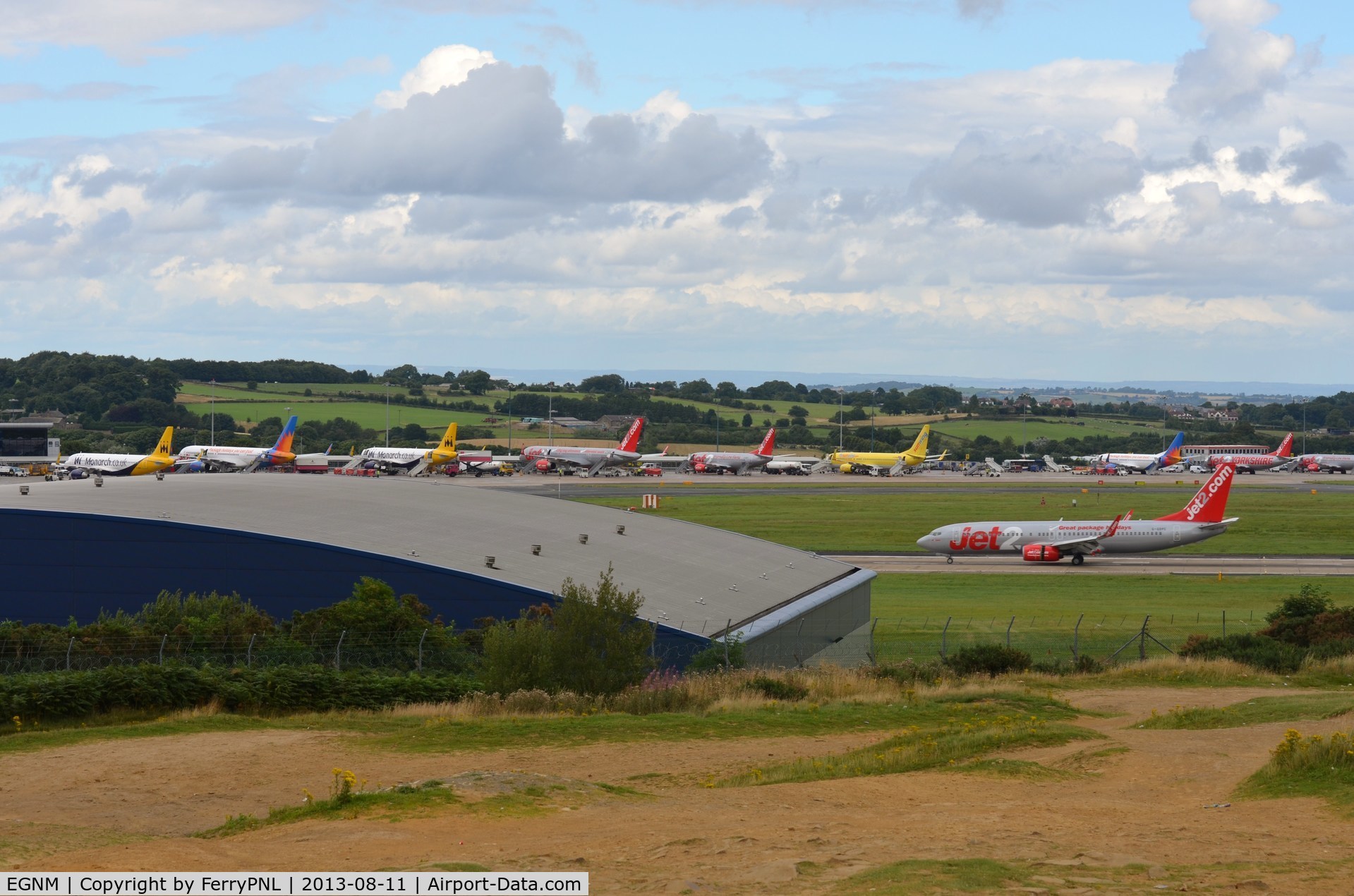 Leeds Bradford International Airport, West Yorkshire, England United Kingdom (EGNM) - Overview of LBA apron during sunday afternoon rush hour.