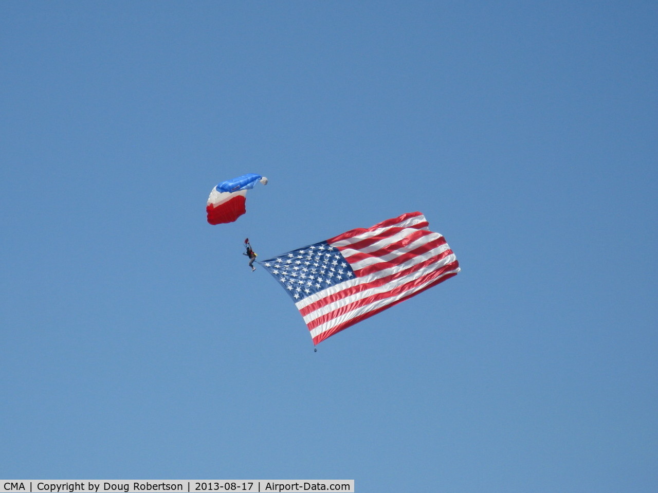 Camarillo Airport (CMA) - Parachute jumper opening Wings Over Camarillo Airshow 2013 with OLD GLORY