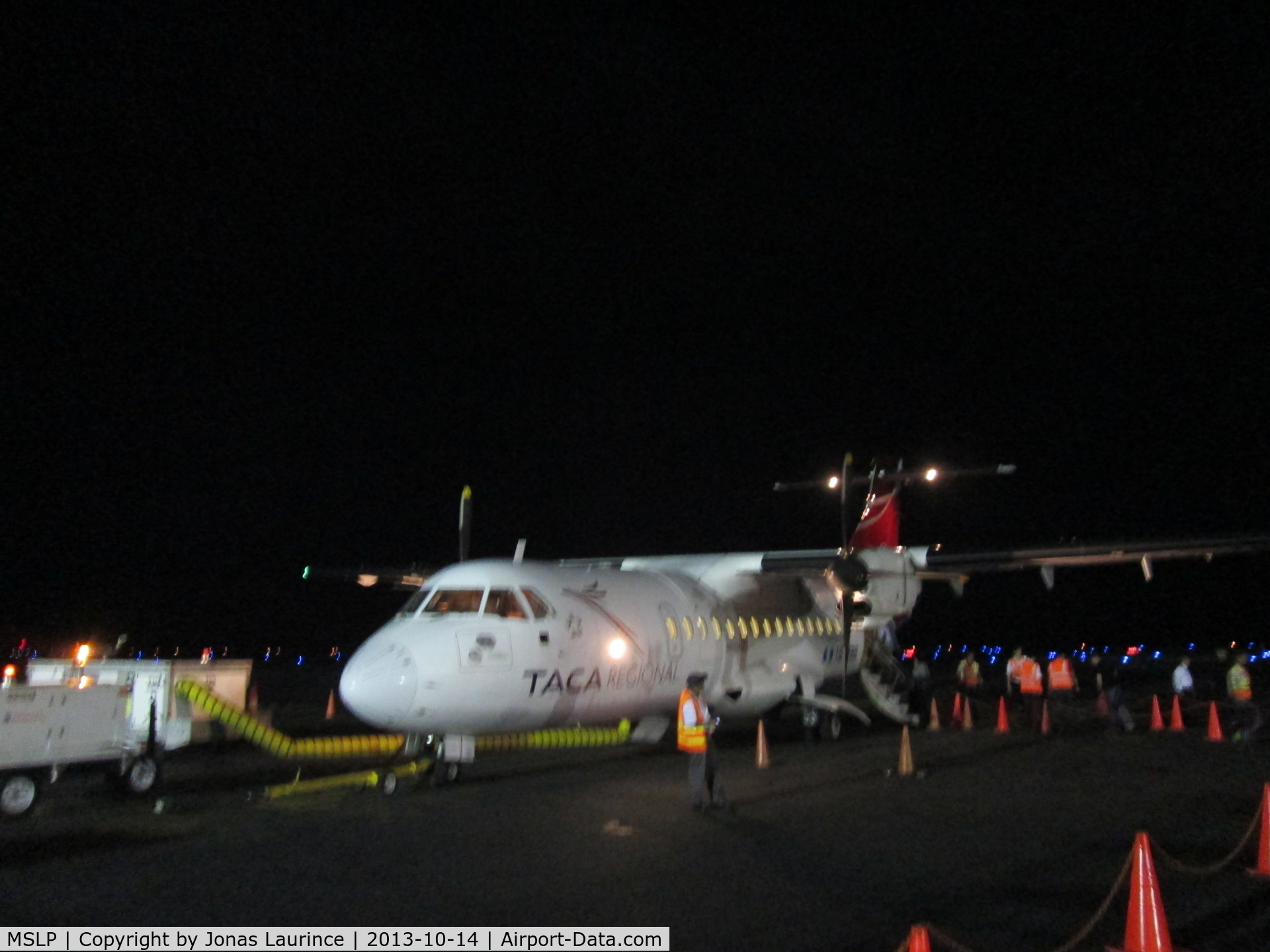 El Salvador International Airport, San Salvador El Salvador (MSLP) - TACA Aircraft boarding to Tegucigalpa at the El Salvador International Airport (Comalpa) of San Salvador