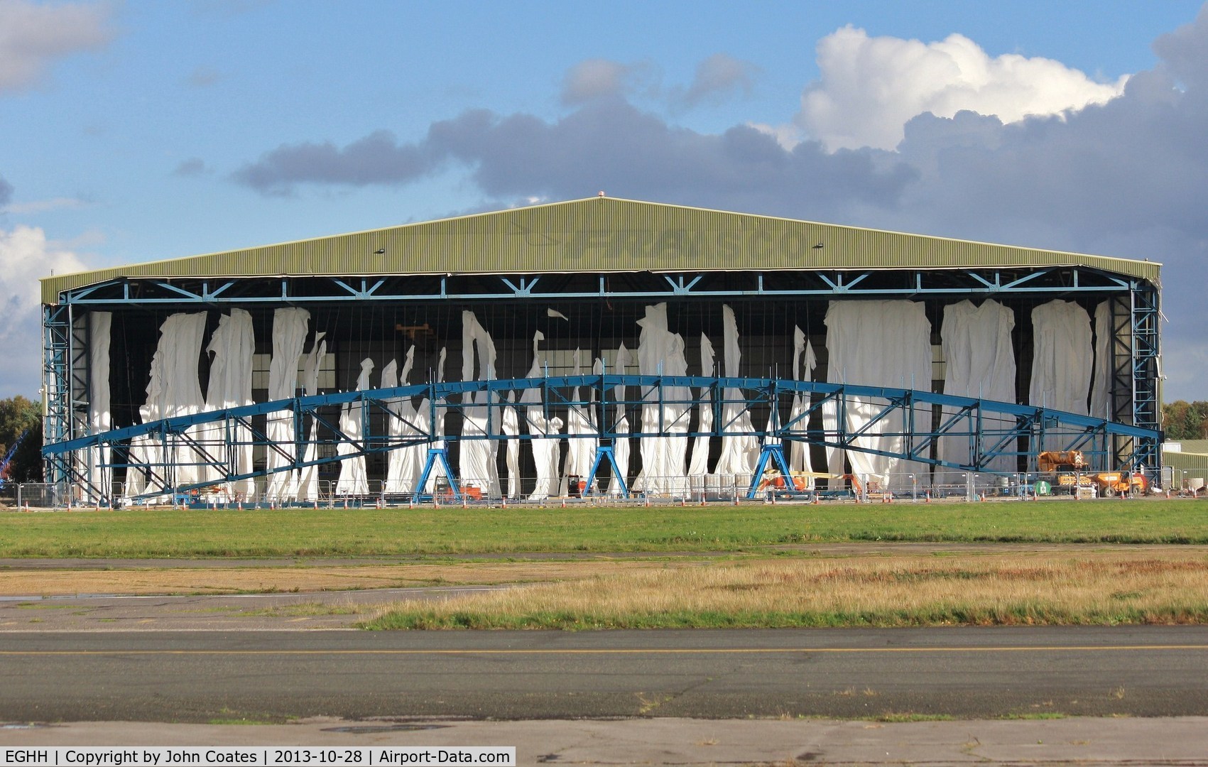 Bournemouth Airport, Bournemouth, England United Kingdom (EGHH) - Building screen for hangar extension shredded in violent storm