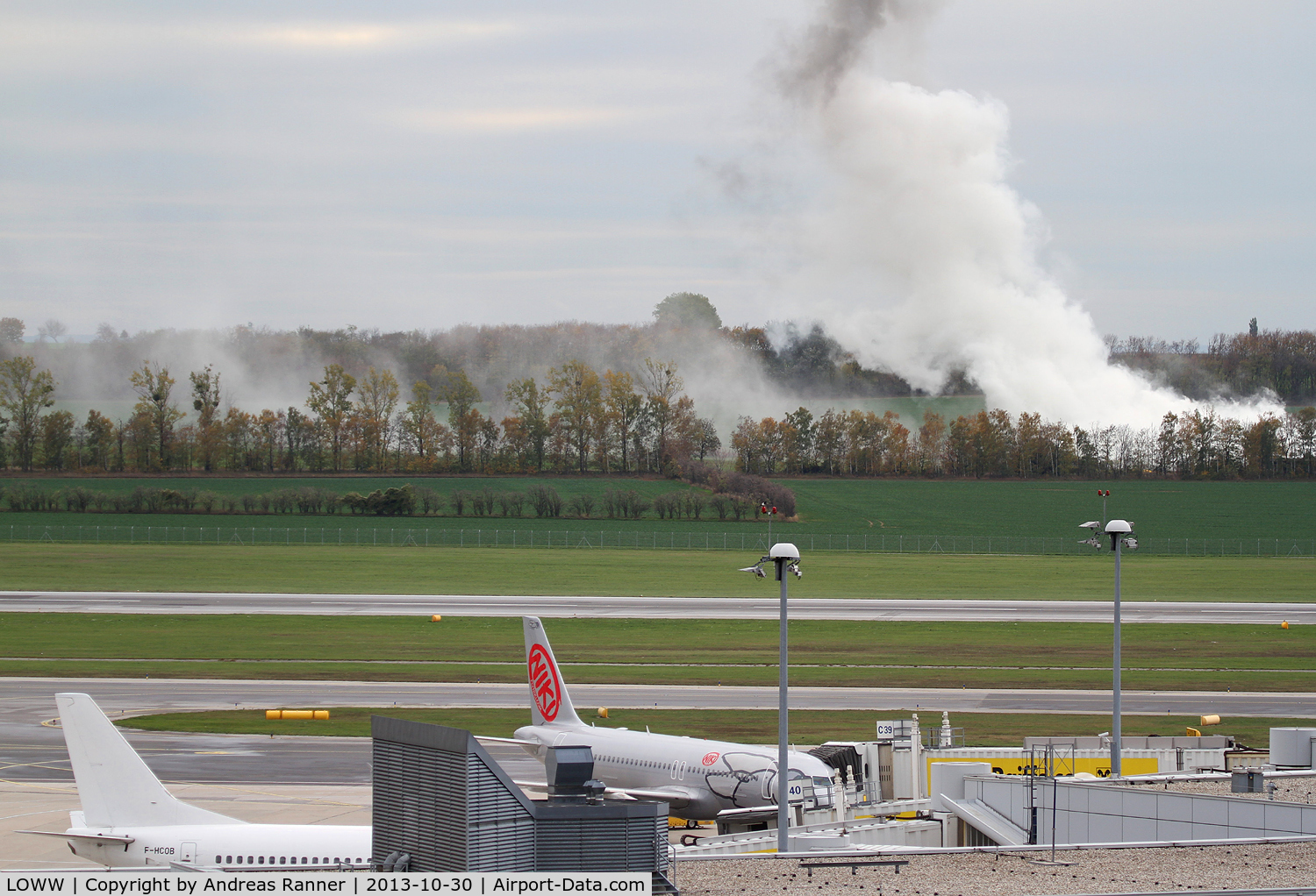 Vienna International Airport, Vienna Austria (LOWW) - white aircraft, white smoke at VIE