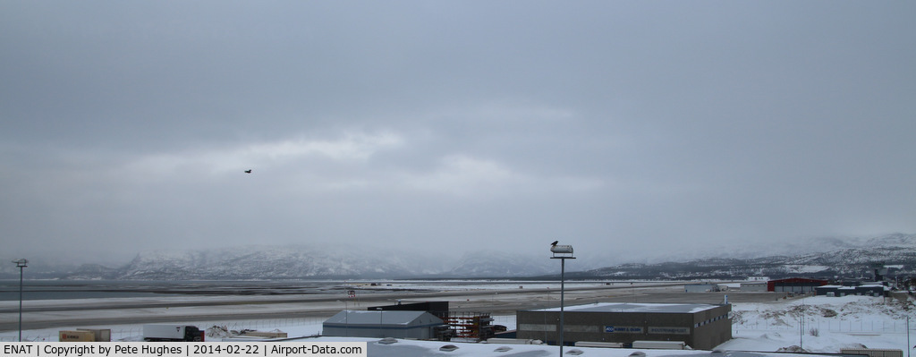 Alta Airport, Alta, Finnmark Norway (ENAT) - Alta's runway viewed across dockside buildings; terminal to rear right of picture.