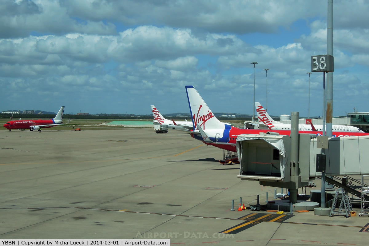 Brisbane International Airport, Brisbane, Queensland Australia (YBBN) - Old Virgin Blue and new Virgin Australia liveries