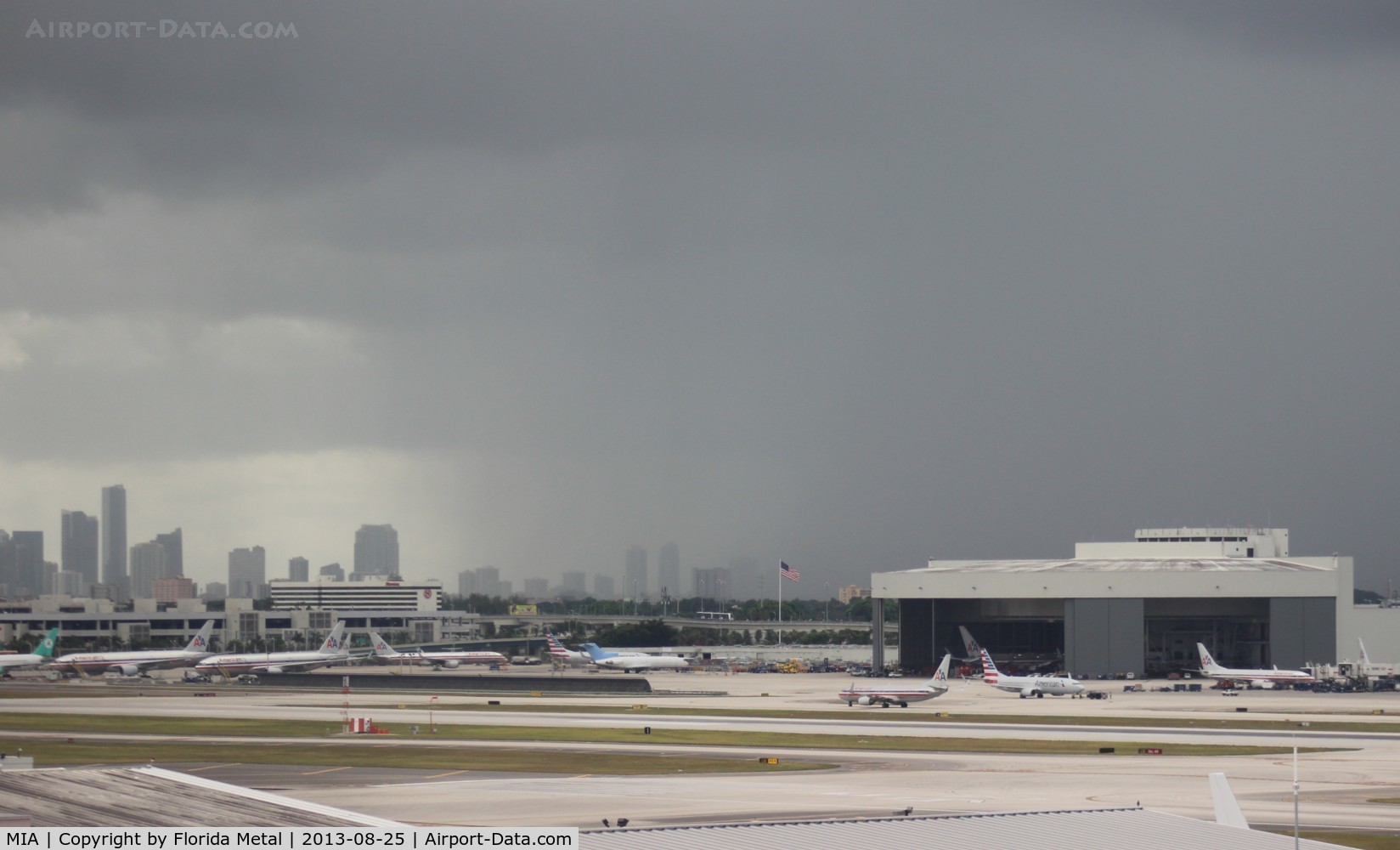 Miami International Airport (MIA) - Miami northeast ramp with storm forming over Downtown