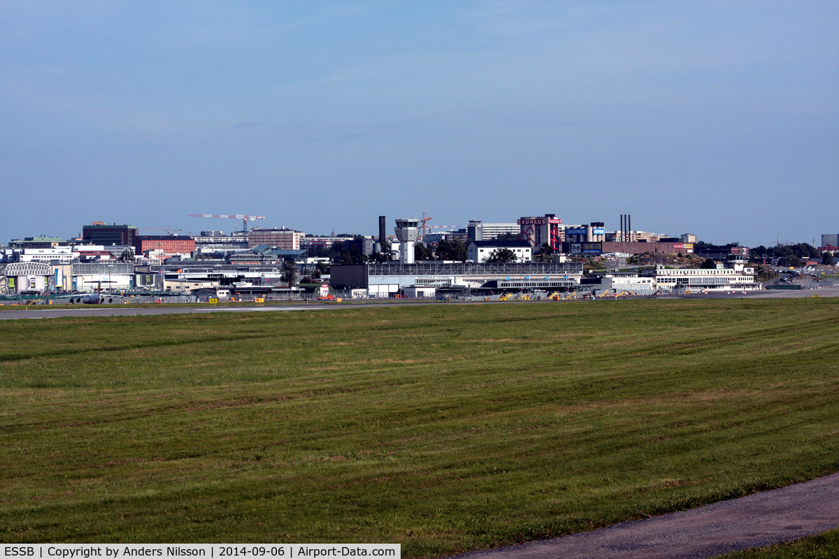 Stockholm-Bromma Airport, Stockholm Sweden (ESSB) - A view of the passenger terminal from the hills west of the airport.