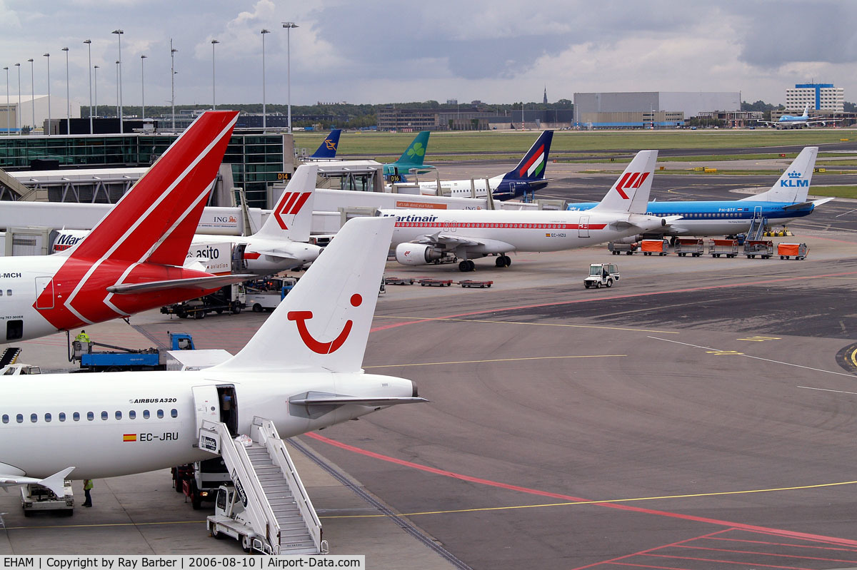 Amsterdam Schiphol Airport, Haarlemmermeer, near Amsterdam Netherlands (EHAM) - Showing a number of Airlines using the airport.