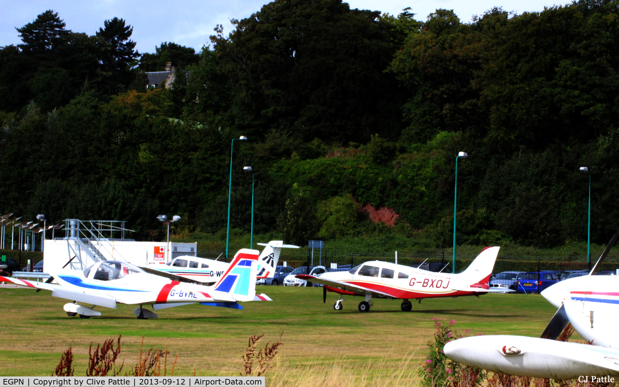 Dundee Airport, Dundee, Scotland United Kingdom (EGPN) - The GA parking area, mostly used by Tayside Aviation aircraft.