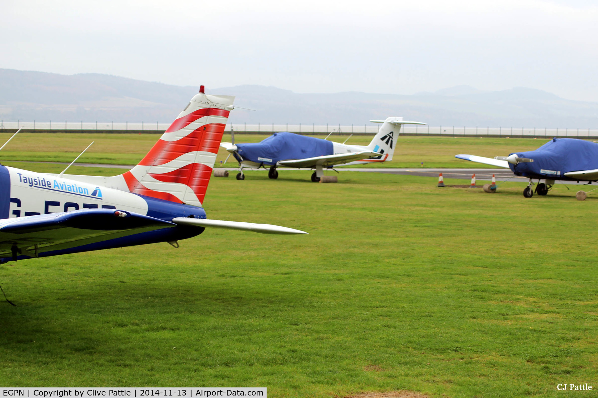 Dundee Airport, Dundee, Scotland United Kingdom (EGPN) - View of parked PA-28's hibernating at Dundee EGPN.