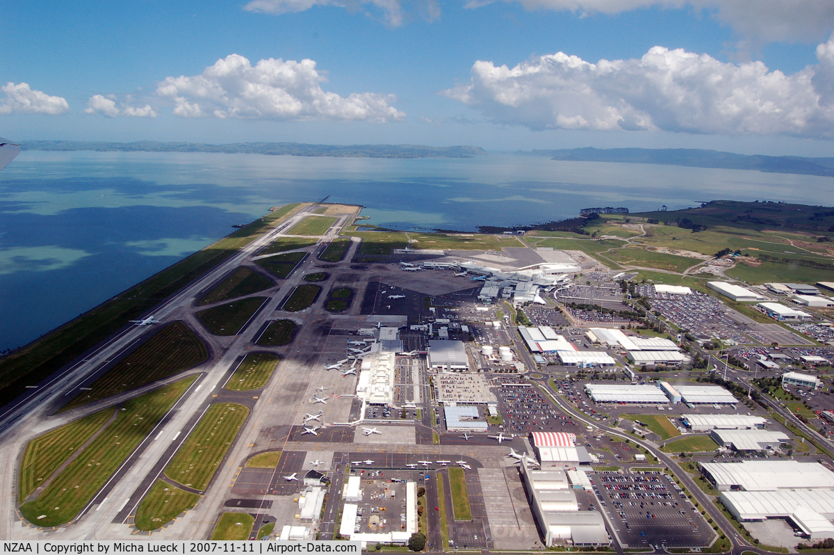 Auckland International Airport, Auckland New Zealand (NZAA) - Enormous amount of aircraft in this photo (taken from DC-3 ZK-DAK)