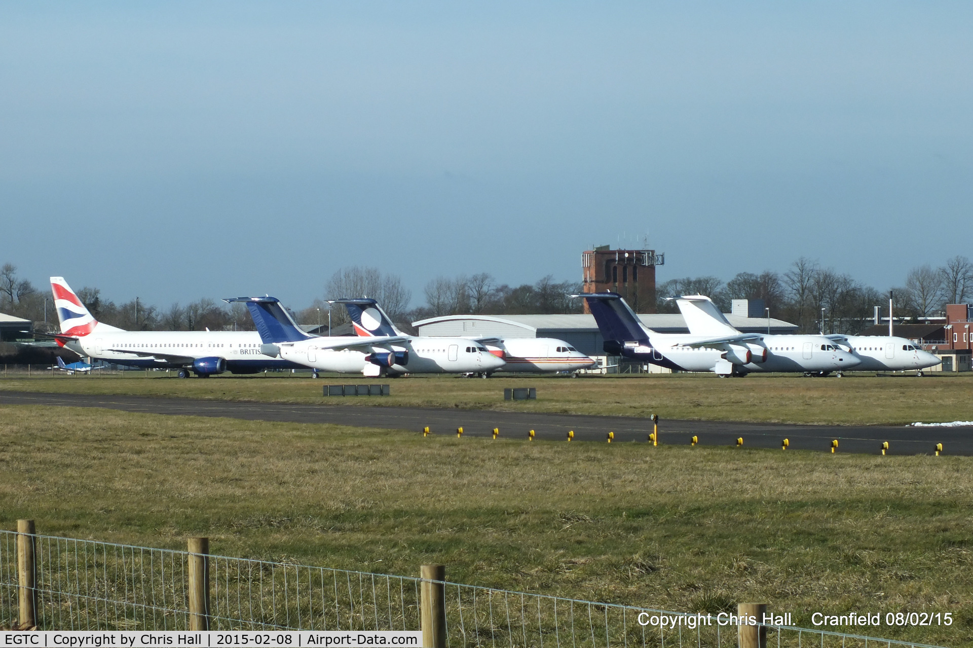 Cranfield Airport, Cranfield, England United Kingdom (EGTC) - four BAe 146's and a B737 in storage at Cranfield