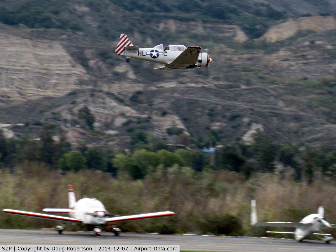 Santa Paula Airport (SZP) - Condor Squadron making another high speed pass flour bombing the riverbed target Commemorating the 7 Dec. 1941 attack on Pearl Harbor.