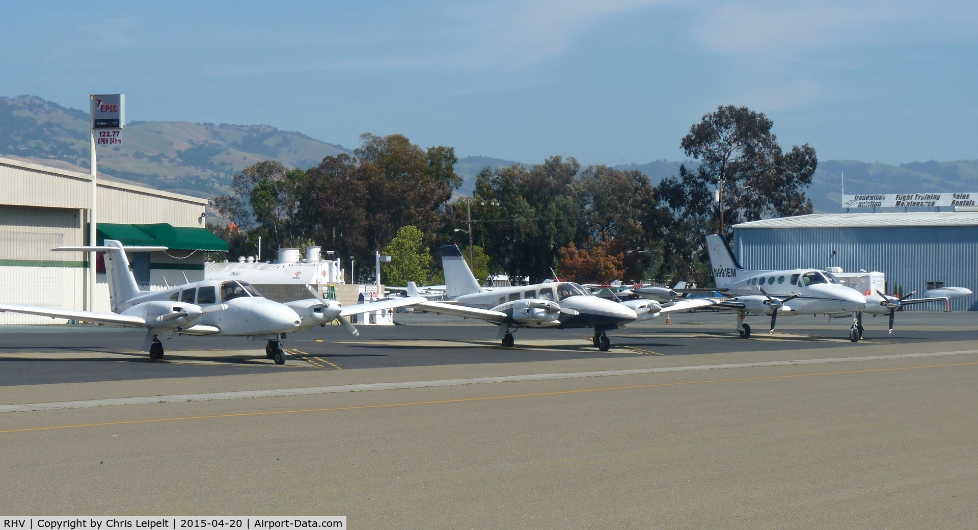 Reid-hillview Of Santa Clara County Airport (RHV) - 3 twin pistons in a row at Nice Air's helipads.