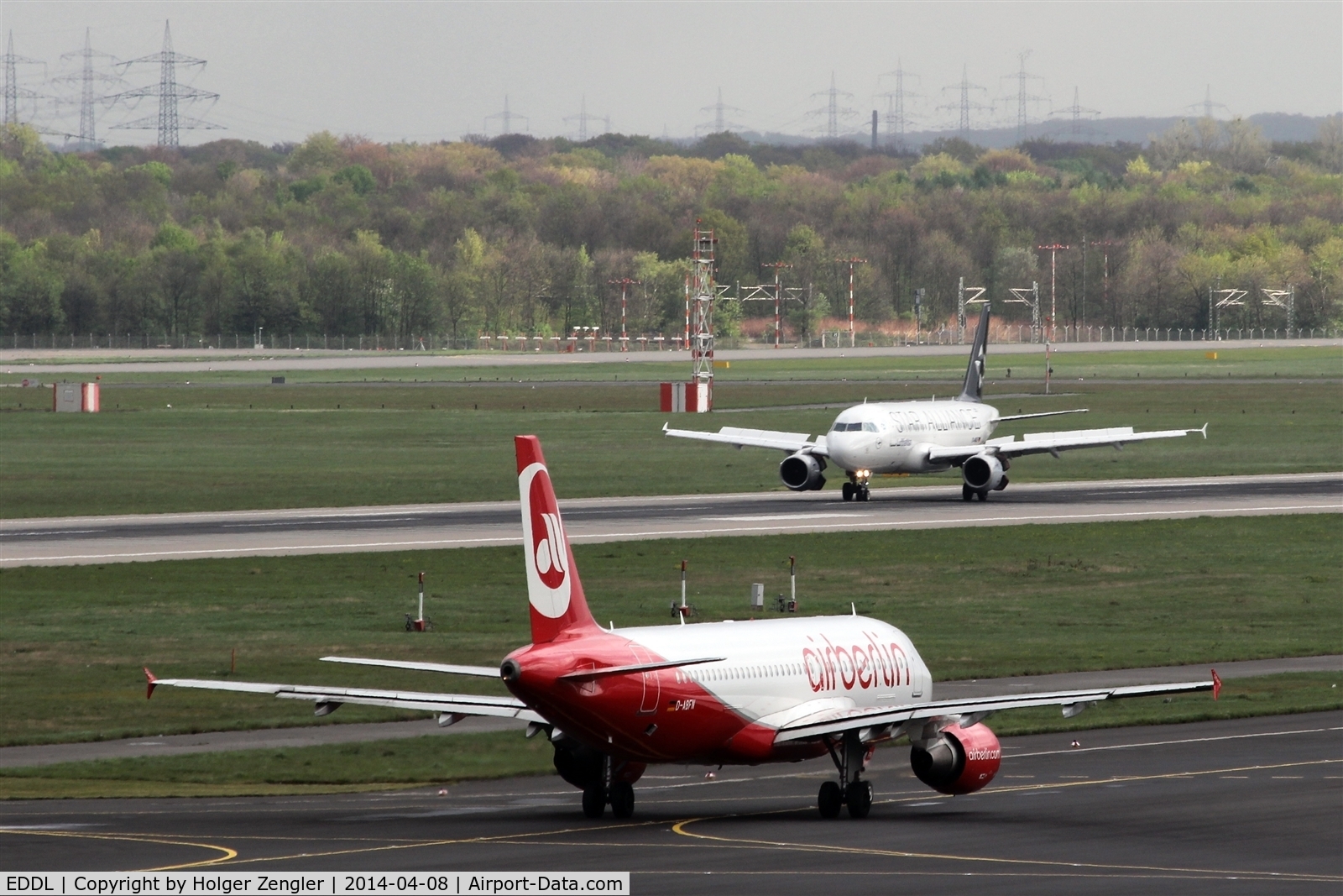 Düsseldorf International Airport, Düsseldorf Germany (EDDL) - Coming from holding point 23L meets going to holding point 23L.....